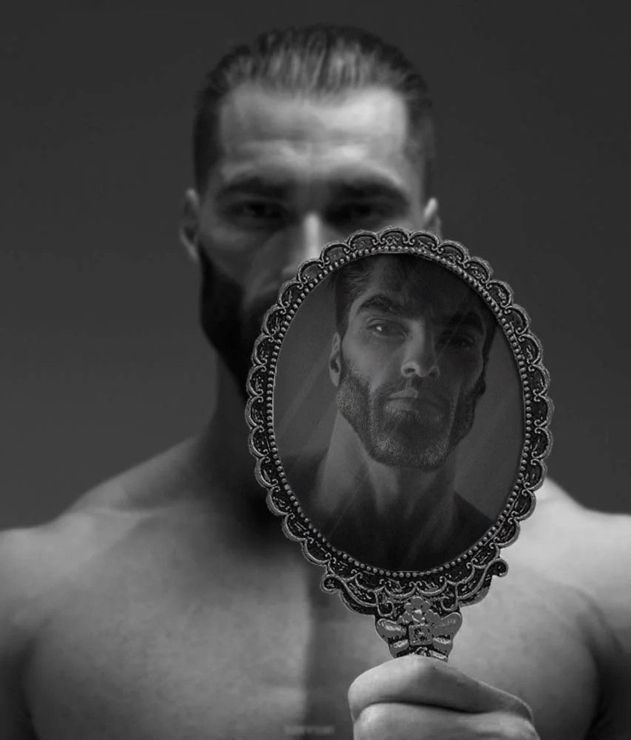 Gigachad holding a hand mirror showing his own reflection