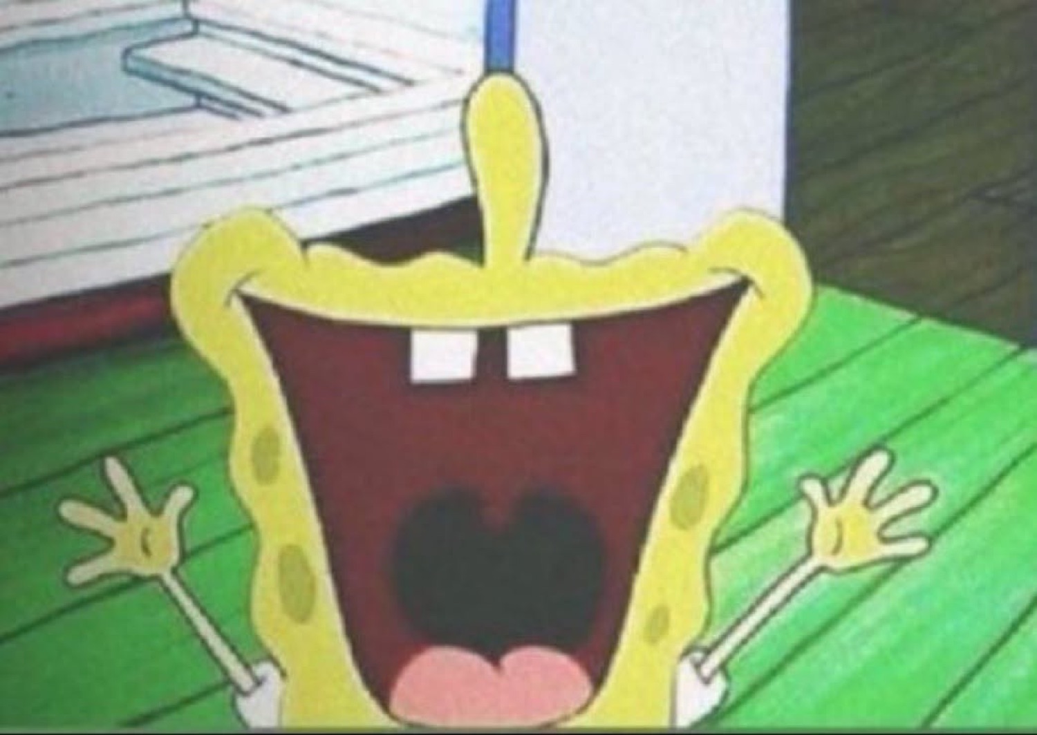 SpongeBob with mouth wide open and arms up, screaming with pure excitement