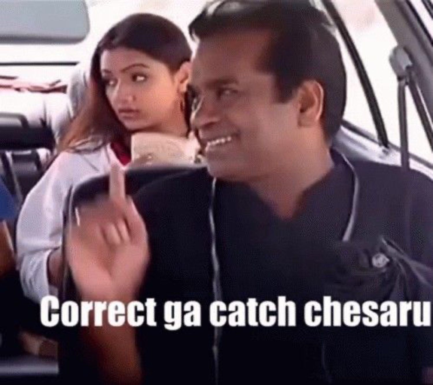 Man in a car pointing knowingly: 'Correct ga catch chesaru' (you caught it right)