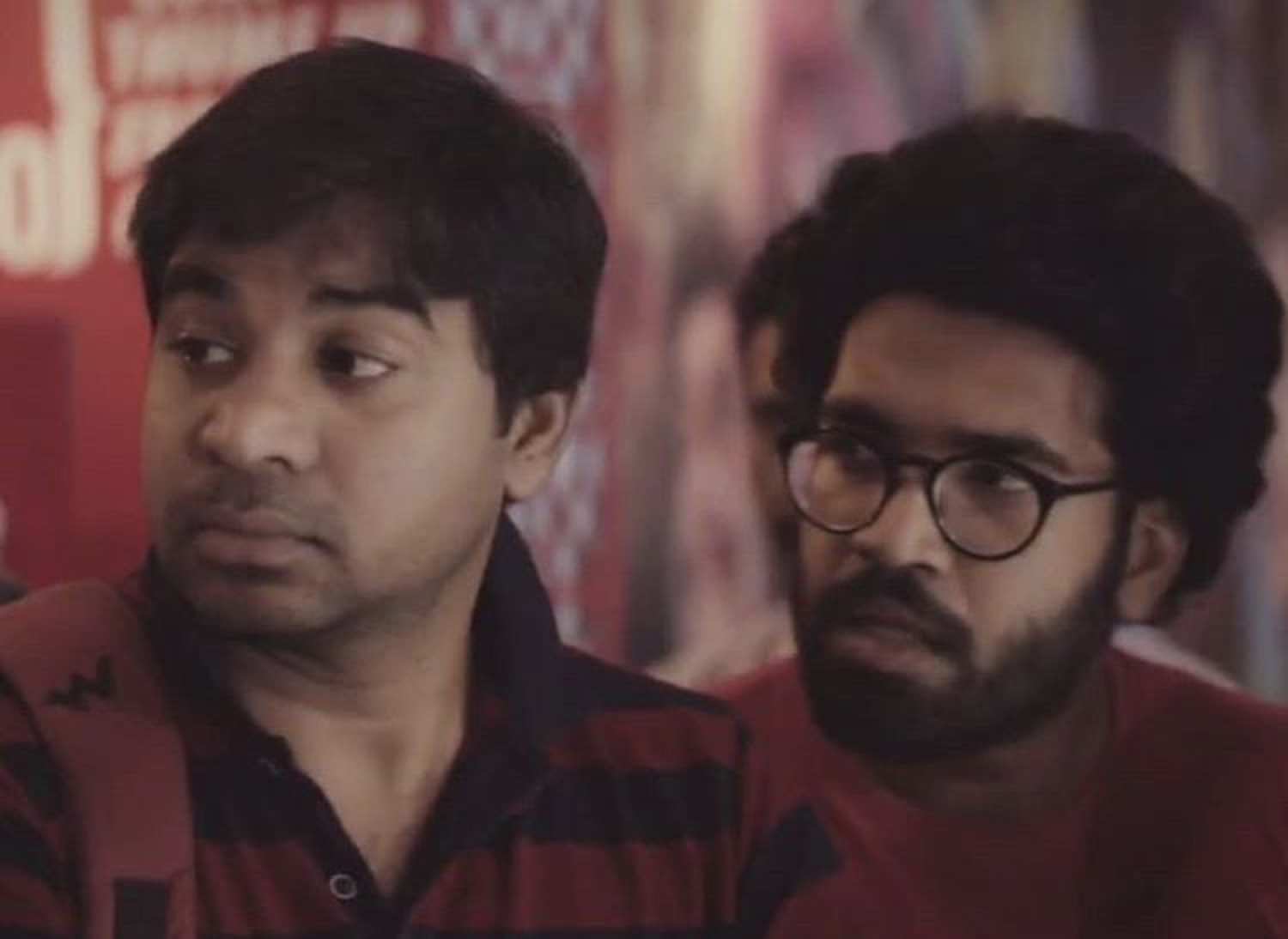 Two guys exchanging a suspicious side-eye