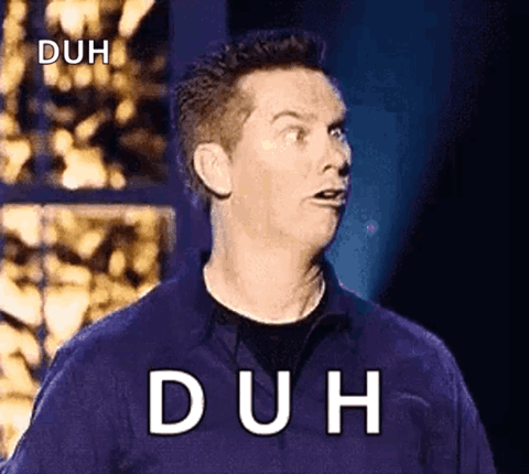 Comedian on stage rolling his eyes and tilting his head, "duh"