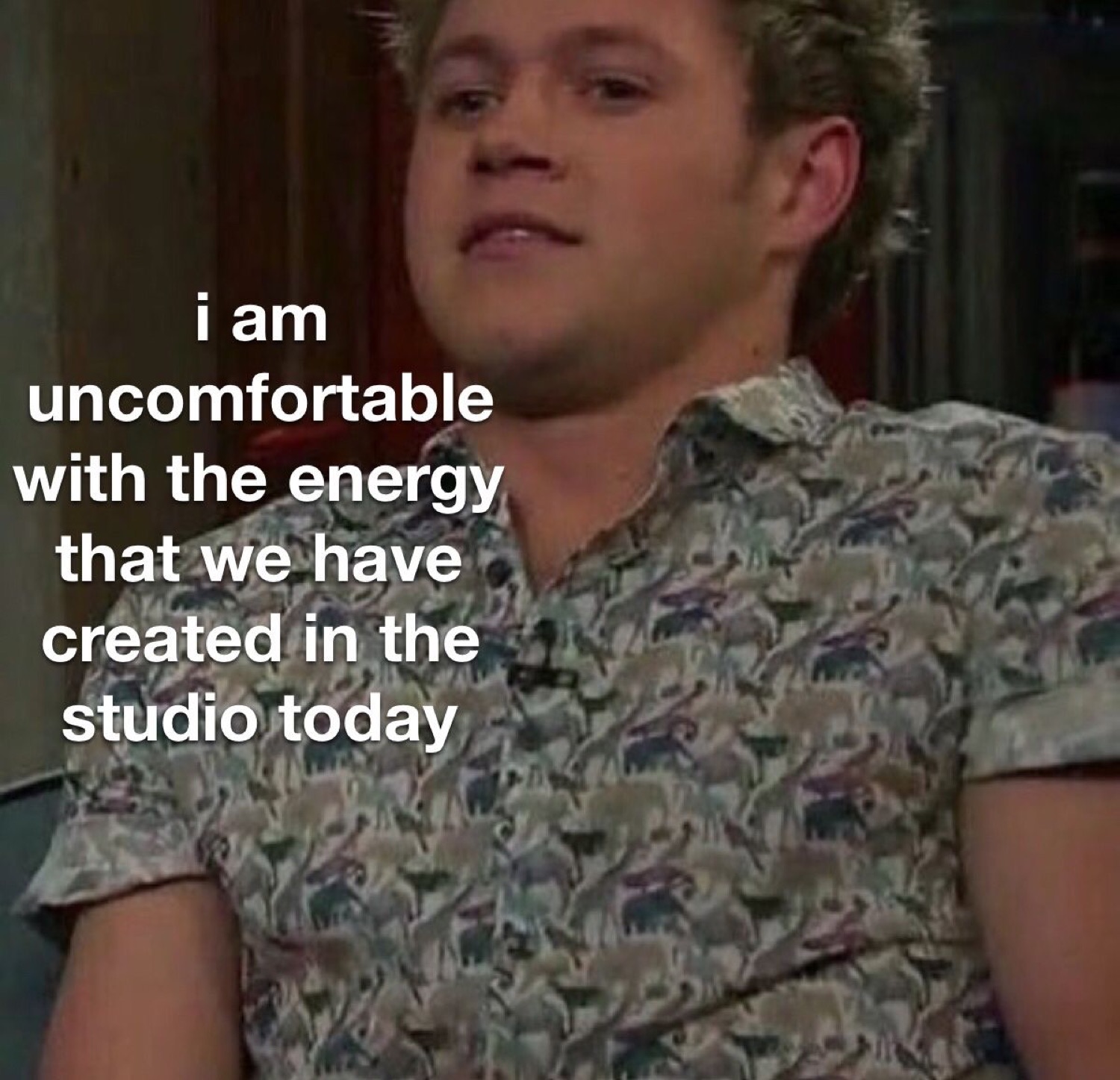 Guy in a patterned shirt captioned 'i am uncomfortable with the energy that we have created in the studio today'
