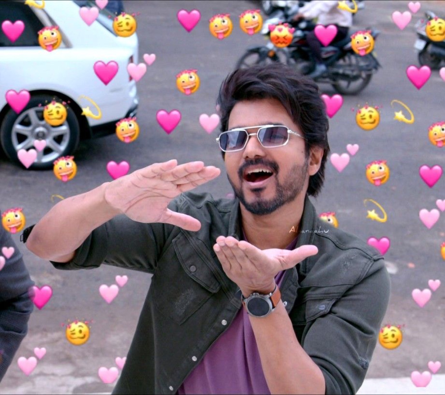 Vijay in sunglasses beaming among heart emojis