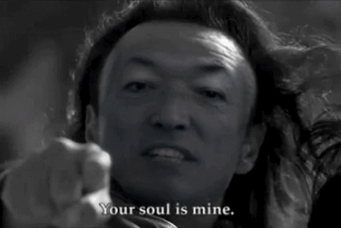 Shang Tsung from Mortal Kombat pointing, "Your soul is mine"