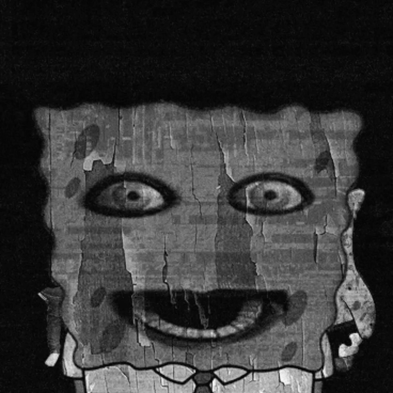 Grayscale cracked SpongeBob with a hollow face and gaping smile