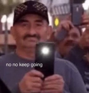 Man in a cap filming with his phone flashlight on, captioned 'no no keep going'