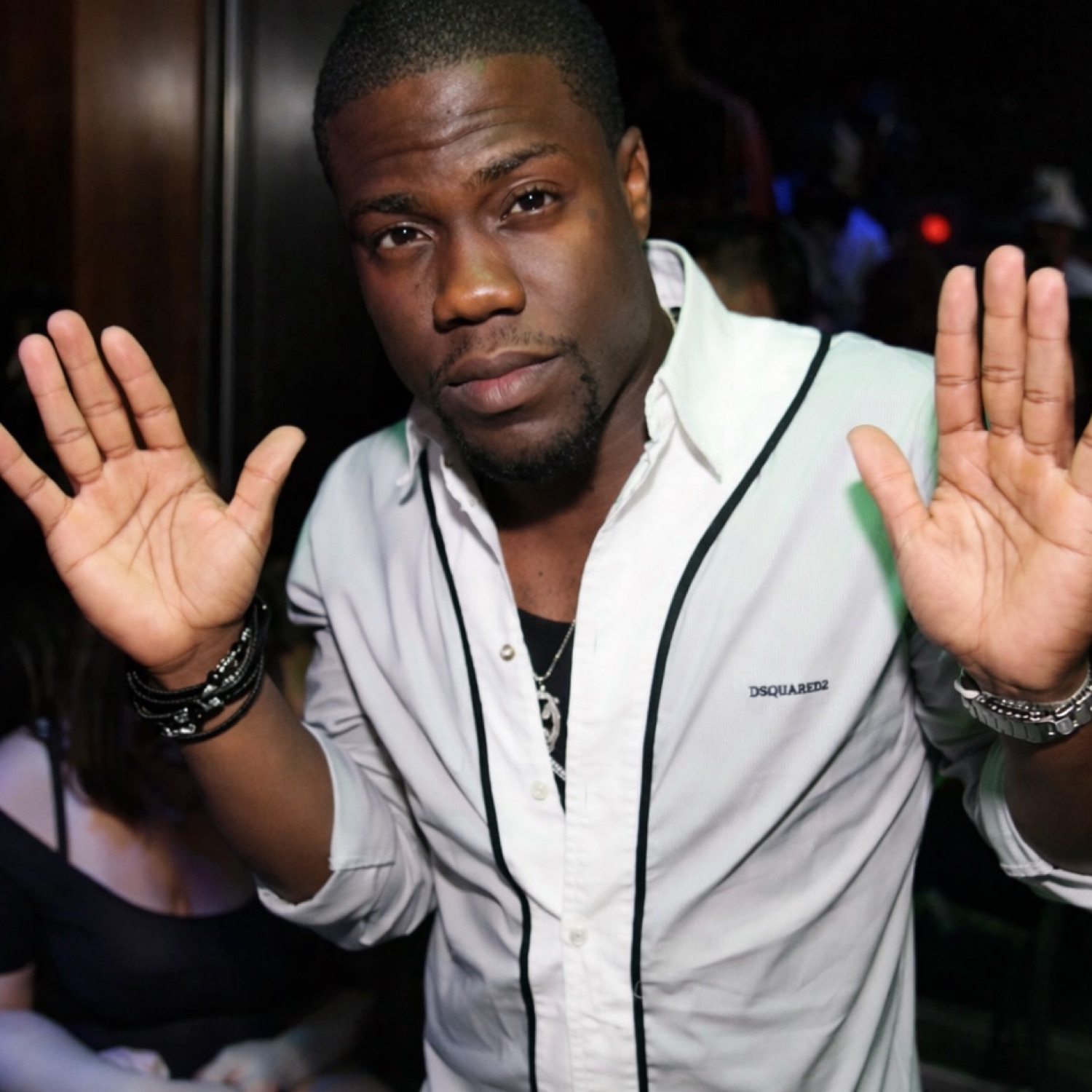 Kevin Hart holding both hands up with a smug 'see?' face