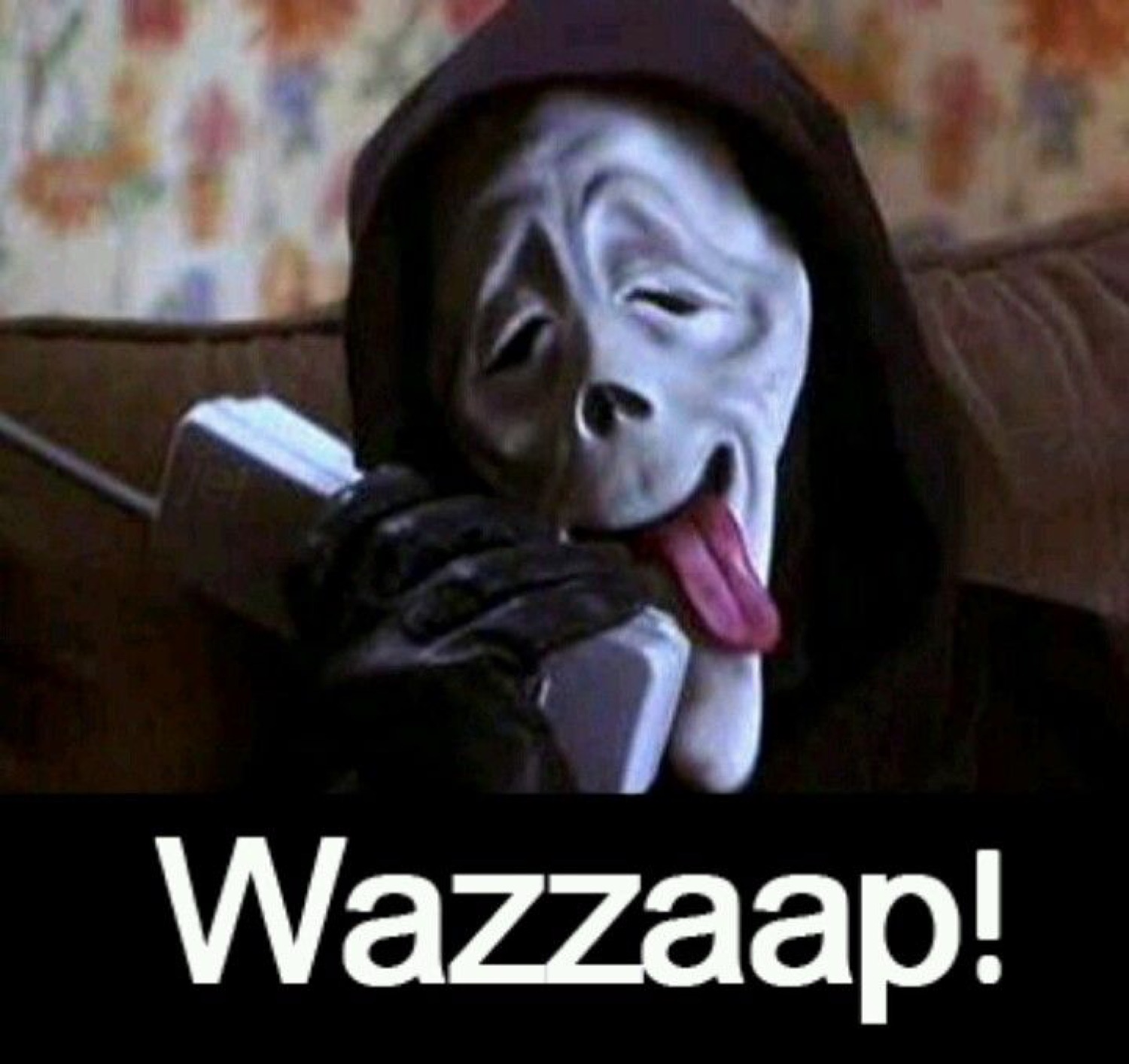 Ghostface on the phone with his tongue out: 'Wazzaap!'