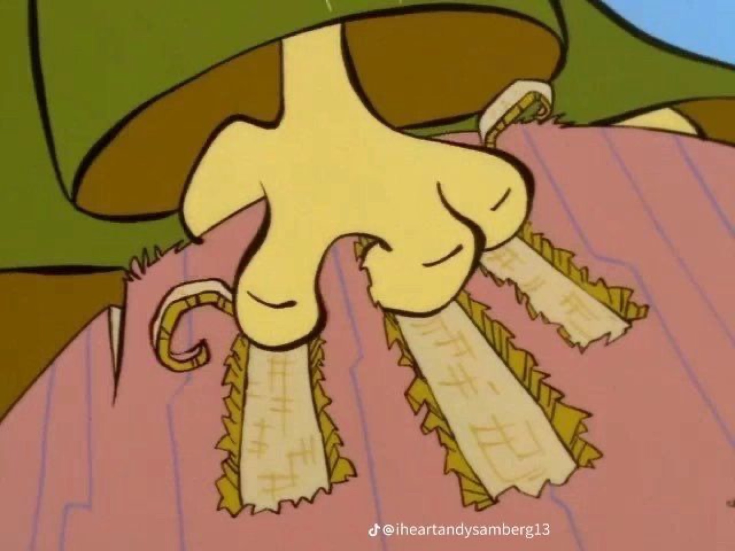Retro cartoon close-up of a scarecrow's straw-stuffed hand splayed out awkwardly