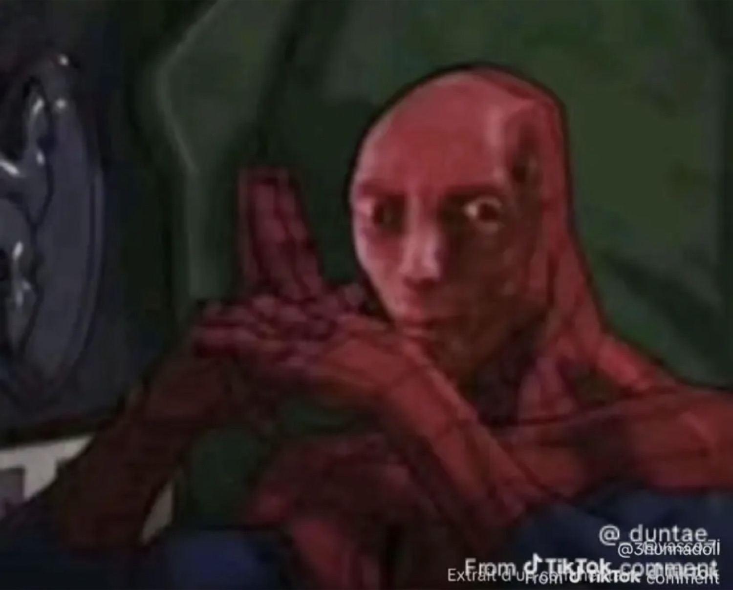 Unmasked Spider-Man crouching in a dark corner with wide, haunted eyes