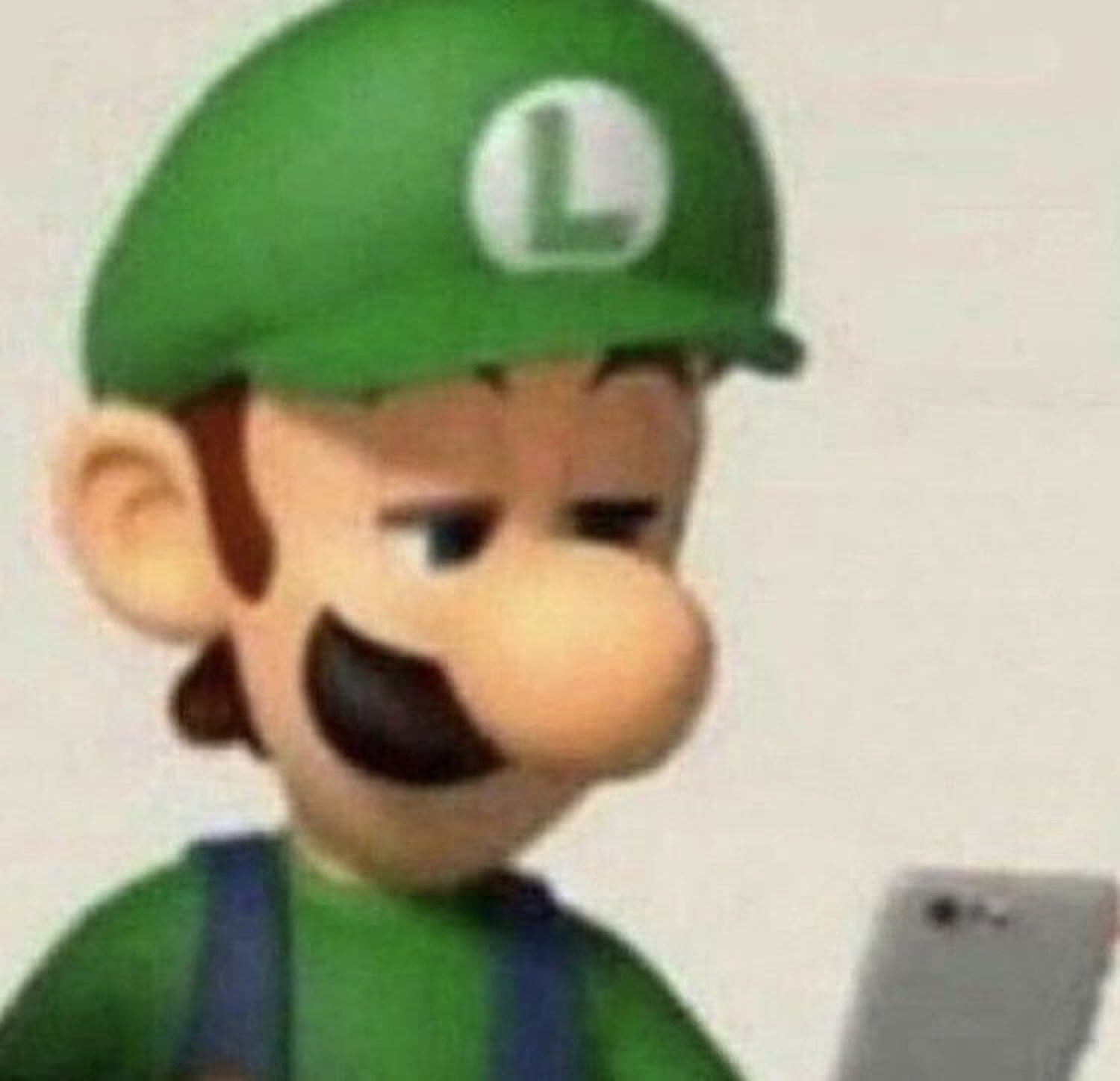 Luigi squinting skeptically down at his phone, thoroughly unimpressed