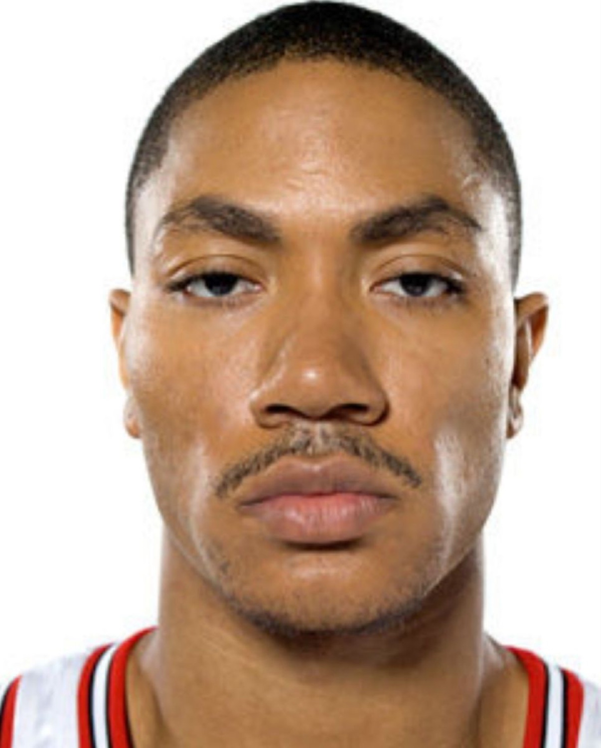 Basketball player staring straight ahead with a flat, deadpan expression