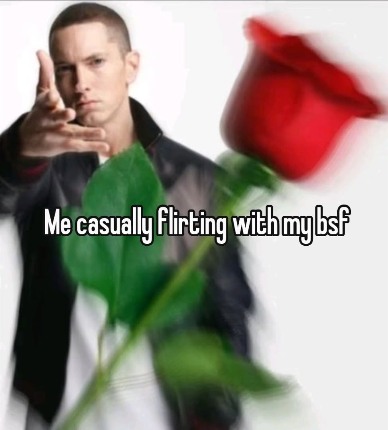 Deadpan Eminem holding a rose captioned 'Me casually flirting with my bsf'