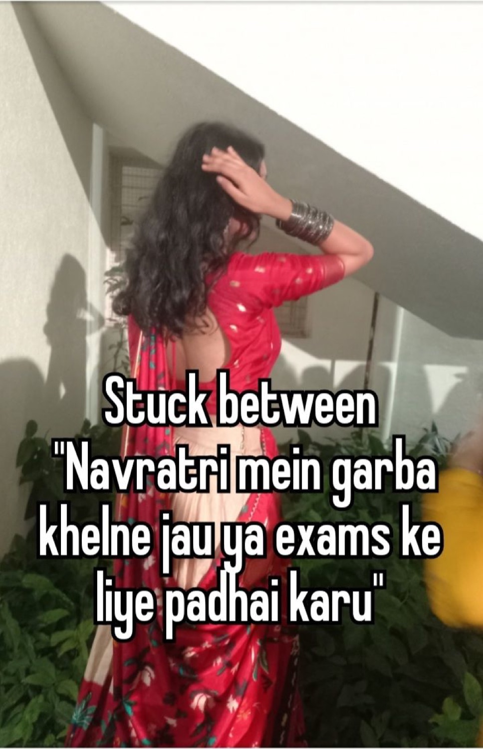 Woman in a red outfit from behind: 'Stuck between "Navratri mein garba khelne jau ya exams ke liye padhai karu"' (go play garba or study for exams)