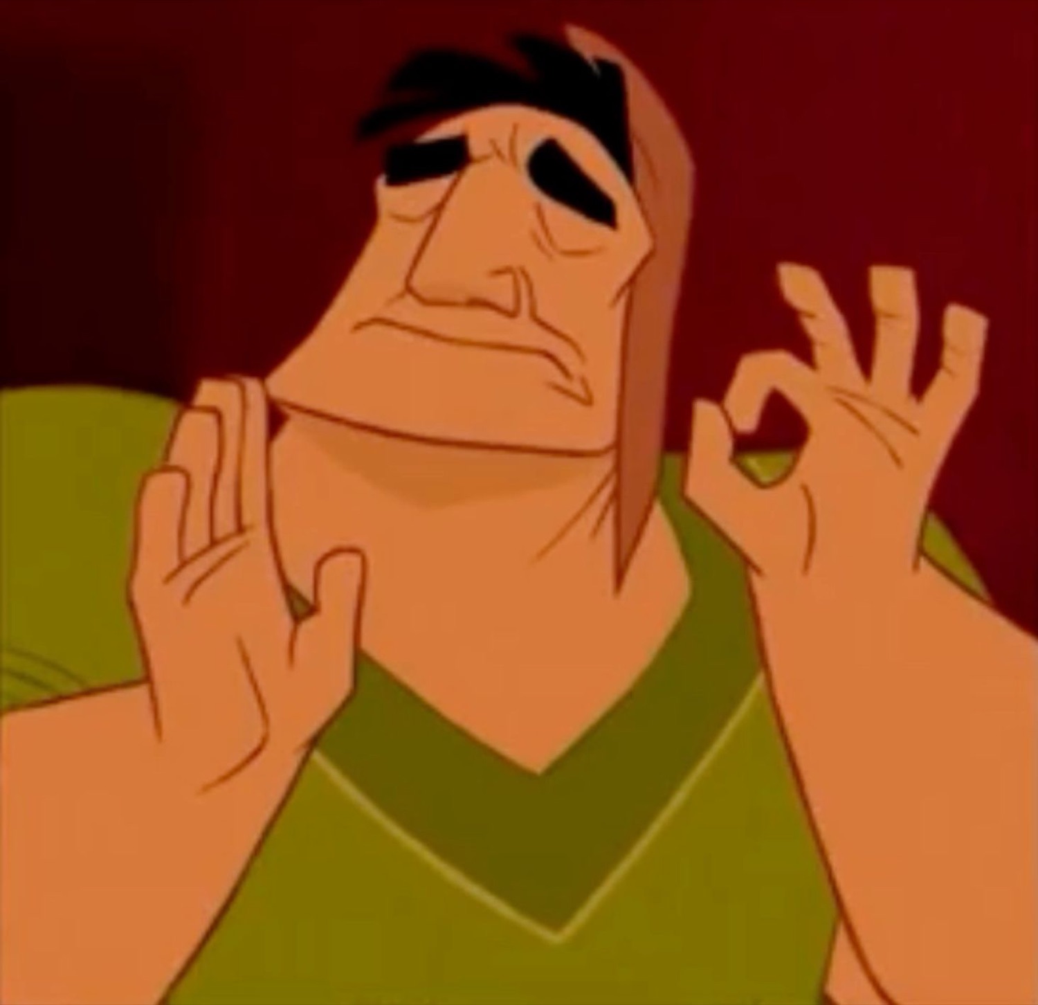 Kronk from The Emperor's New Groove making a chef's kiss gesture with a self-satisfied smirk