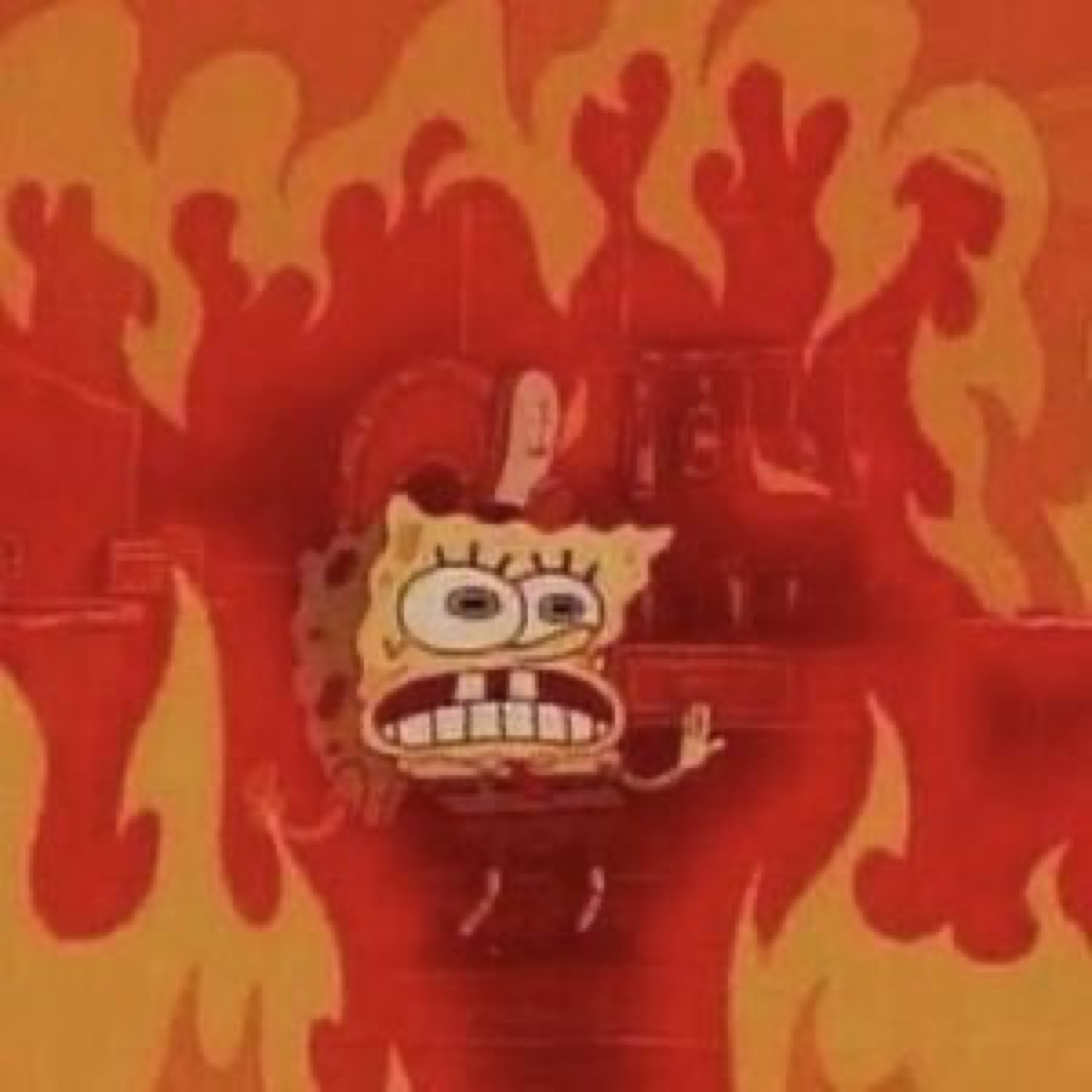 SpongeBob standing in raging flames with a stressed, gritted-teeth panic face