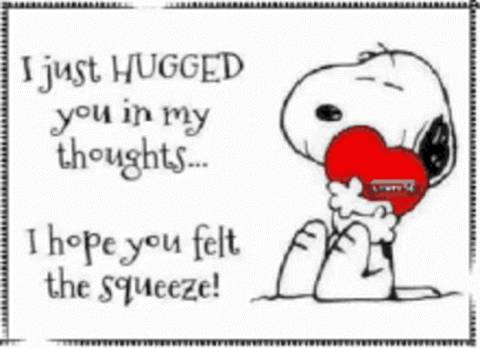 Snoopy squeezing a red heart, "I just hugged you in my thoughts, I hope you felt the squeeze!"