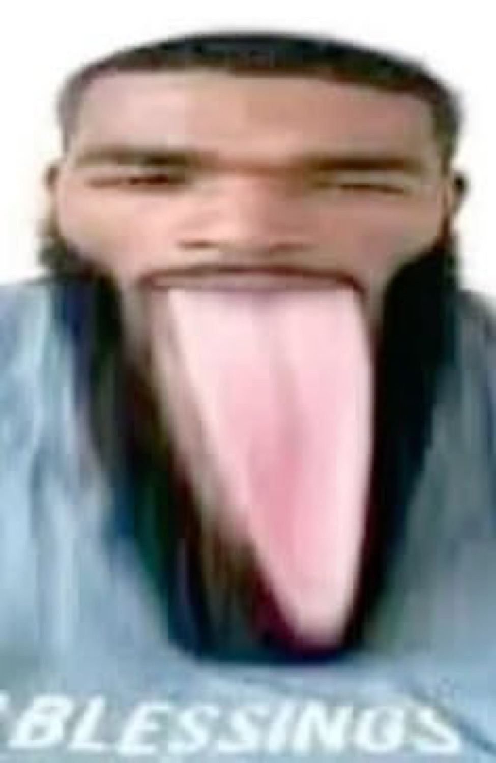 Stretched blurry face with a giant tongue sticking out over 'BLESSINGS'