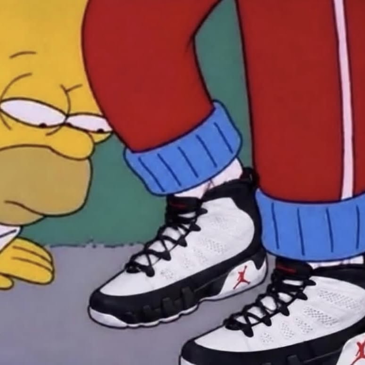 Homer Simpson looking down at his own Air Jordan 9 sneakers
