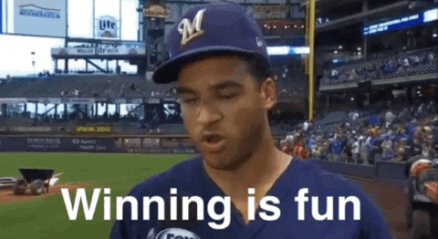 Brewers player in a cap saying "Winning is fun"