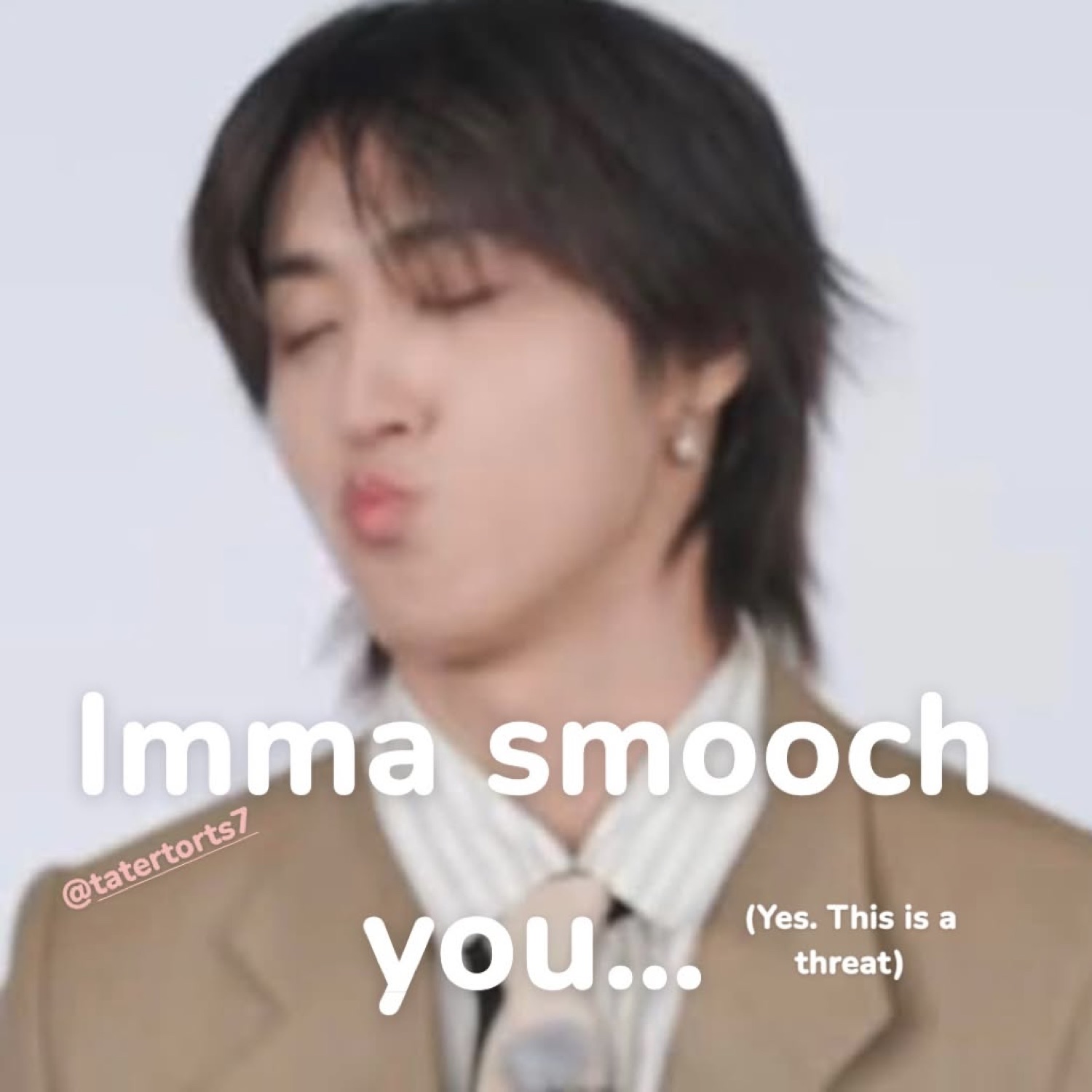 Guy puckering up for a kiss over 'Imma smooch you... (Yes. This is a threat)'