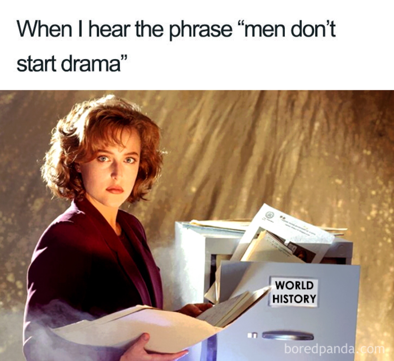 Woman holding a box labeled WORLD HISTORY: 'When I hear the phrase "men don't start drama"'