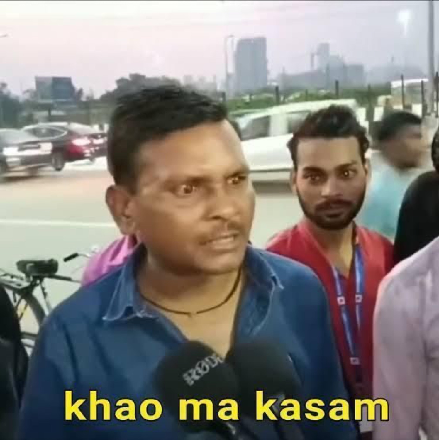 Man in a news interview glaring: 'khao ma kasam' (swear on your mother)
