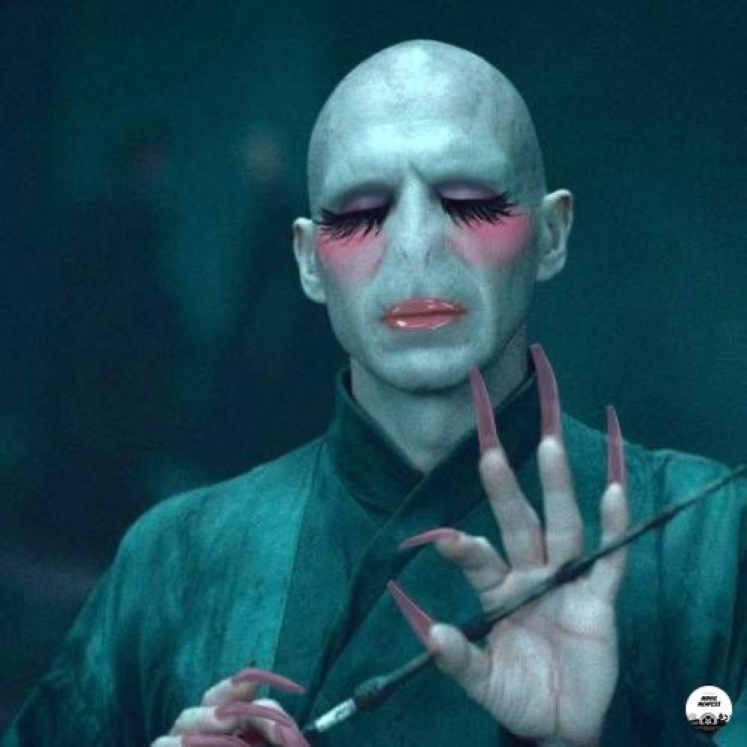 Voldemort edited with long eyelashes, pink lips and long nails, posing delicately