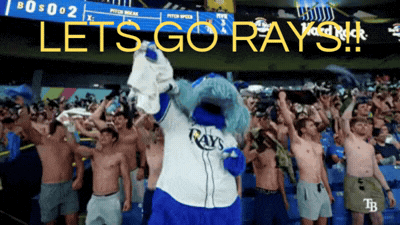 Raymond the mascot hyping a cheering crowd, "Lets go Rays!!"