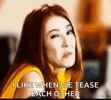 Woman with a playful smirk, "I like when we tease each other"