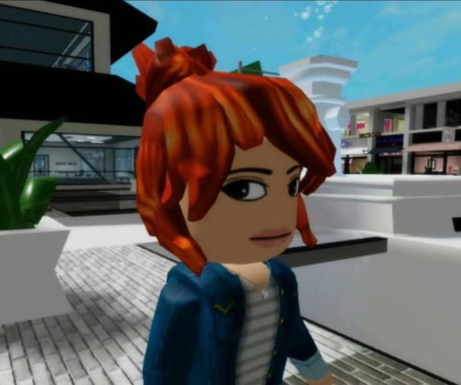 Red-haired video-game avatar staring flatly with a bored, unimpressed look