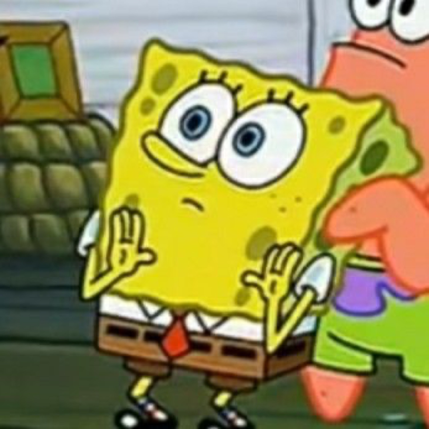 SpongeBob SquarePants with a nervous guilty smile and hands raised defensively