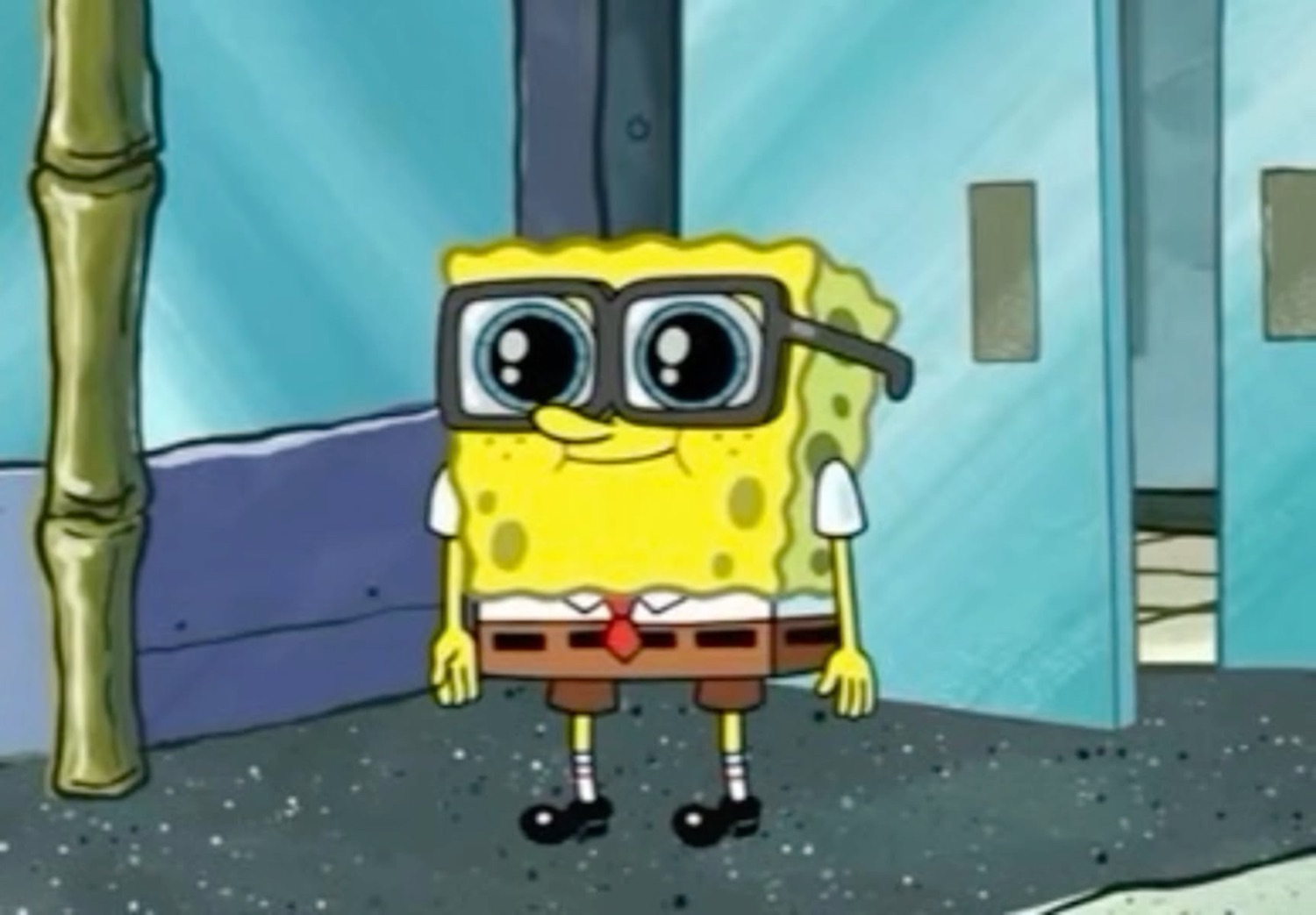 SpongeBob in oversized glasses giving a shy, uncertain smile