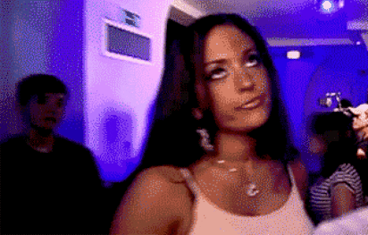 Woman rolling her eyes and waving her hand dismissively