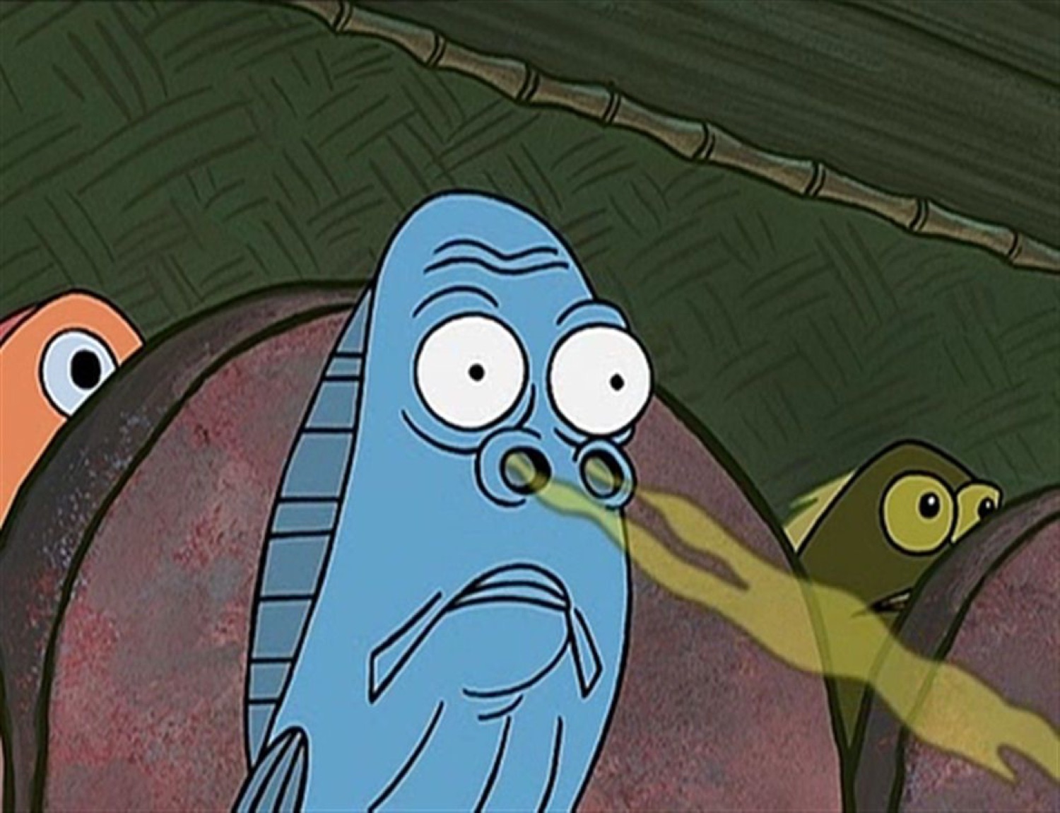 Fish in a theater seat with green stink flowing into its nose