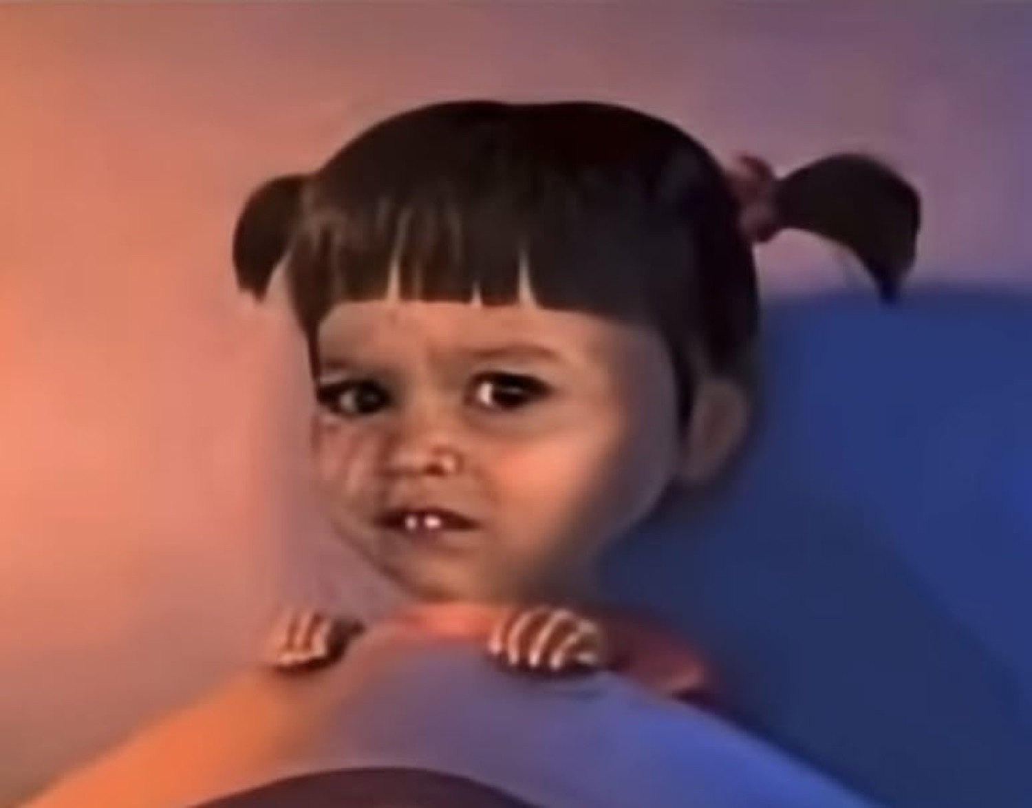 Blurry cursed edit of Boo from Monsters Inc pulling an uneasy grimace