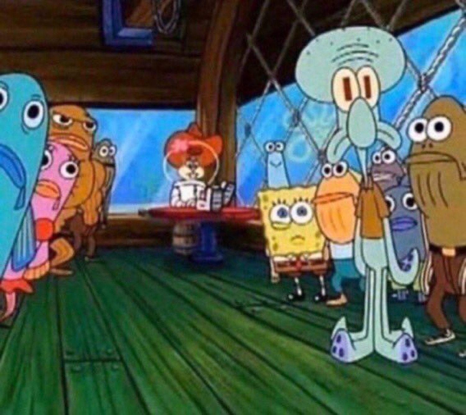 SpongeBob and Squidward nervously standing in the Krusty Krab as the whole crowd stares them down