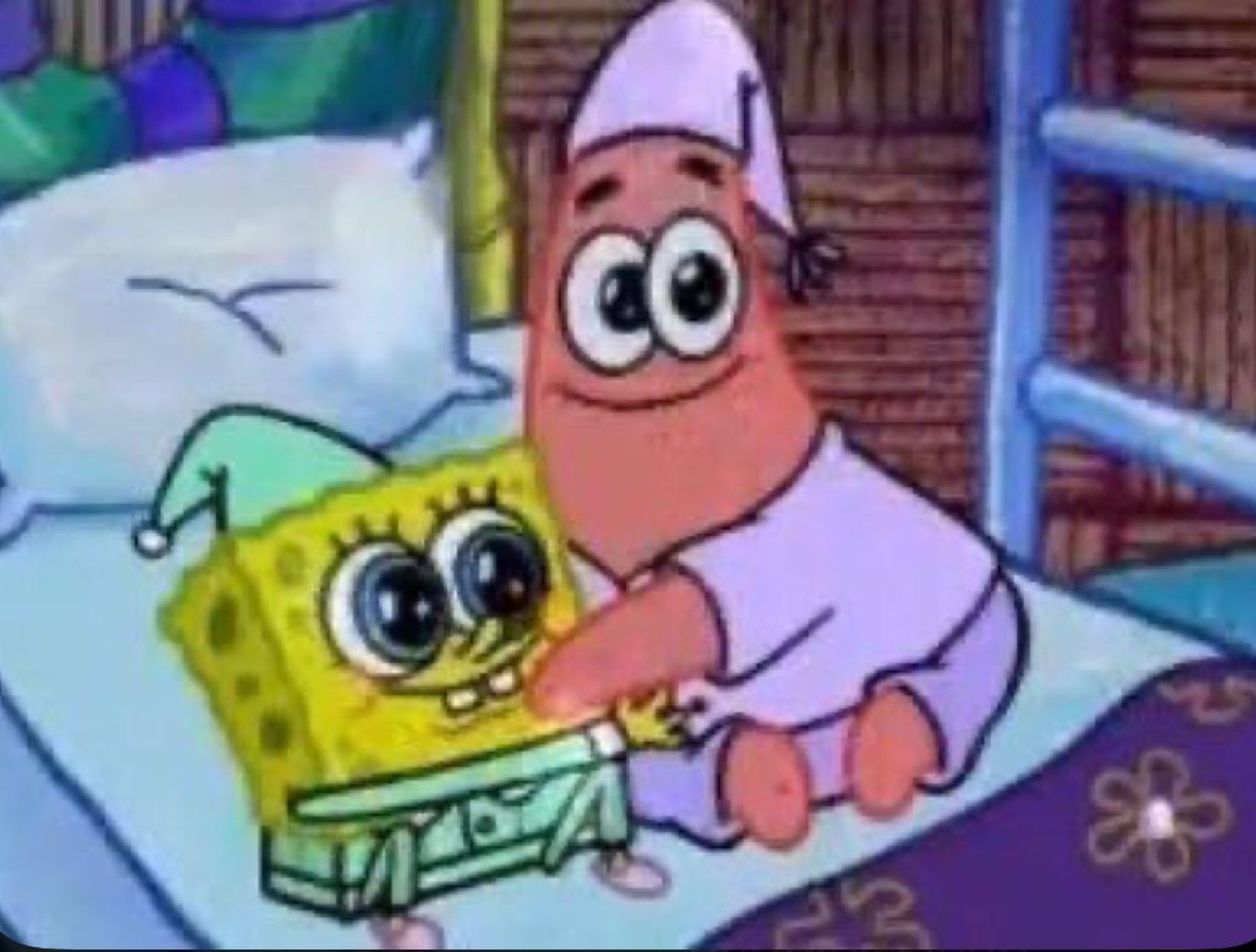 SpongeBob and Patrick in pajamas sharing a wholesome sleepover hug