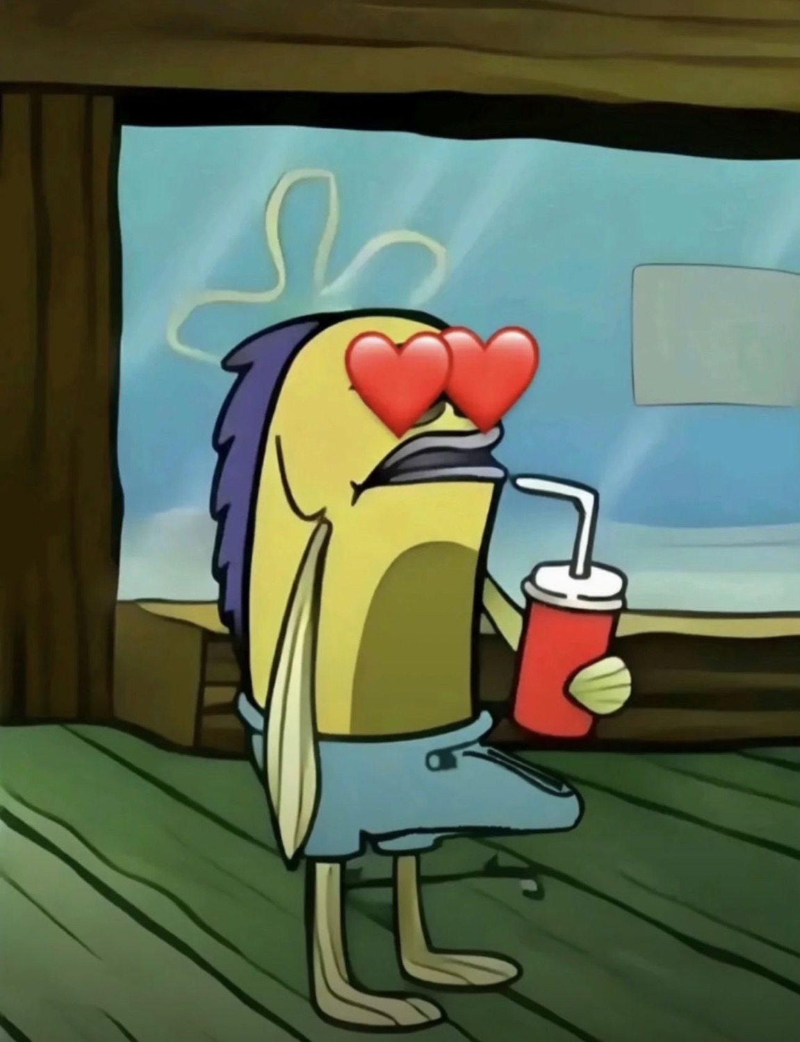 Fish with heart eyes sipping a drink