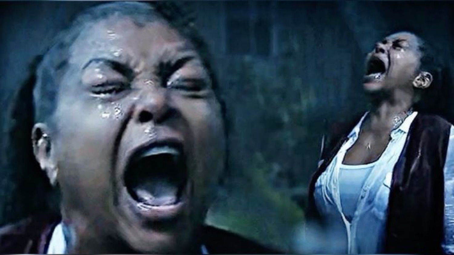 Two women screaming and sobbing dramatically in the pouring rain