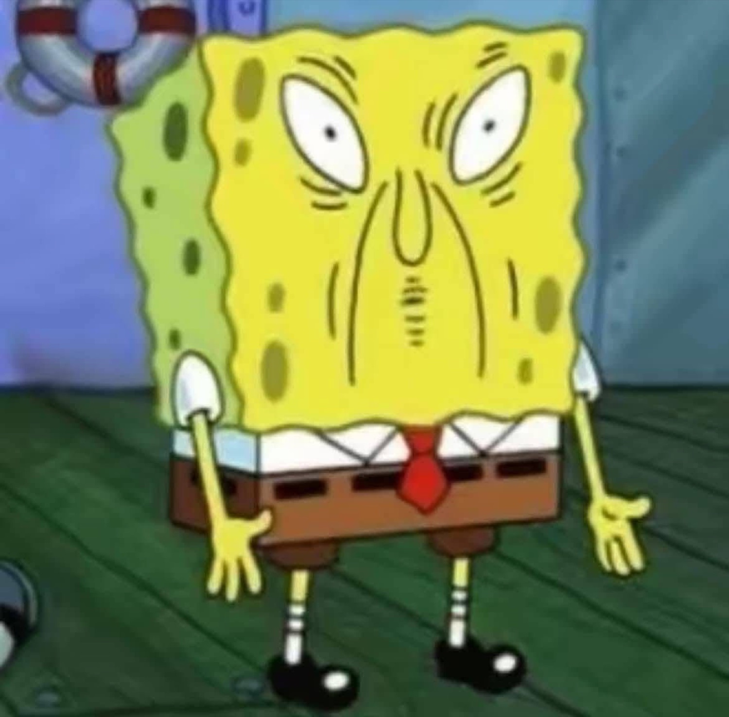 SpongeBob with a scrunched, disgusted face and arms out