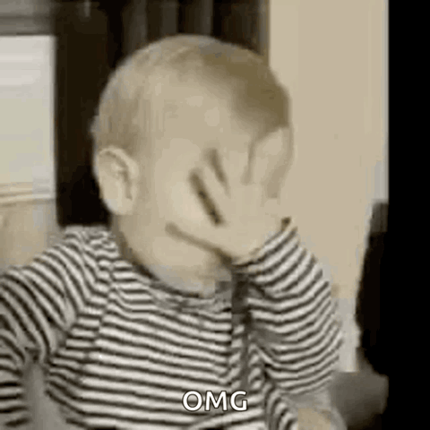 Baby covering his face in disbelief, "OMG"