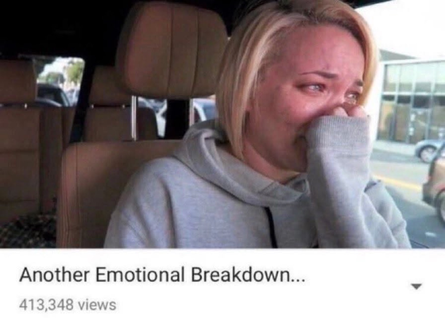Woman crying in a car with the YouTube title 'Another Emotional Breakdown...' and 413K views