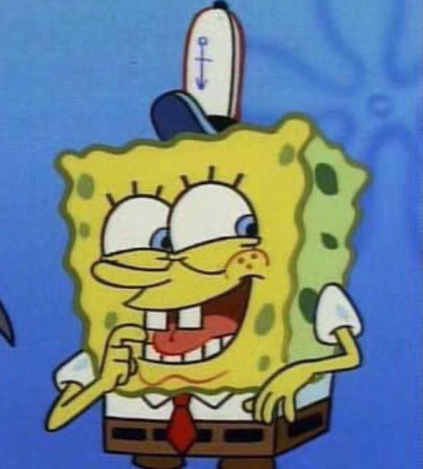 SpongeBob in a sailor hat with a squinty, up-to-something grin