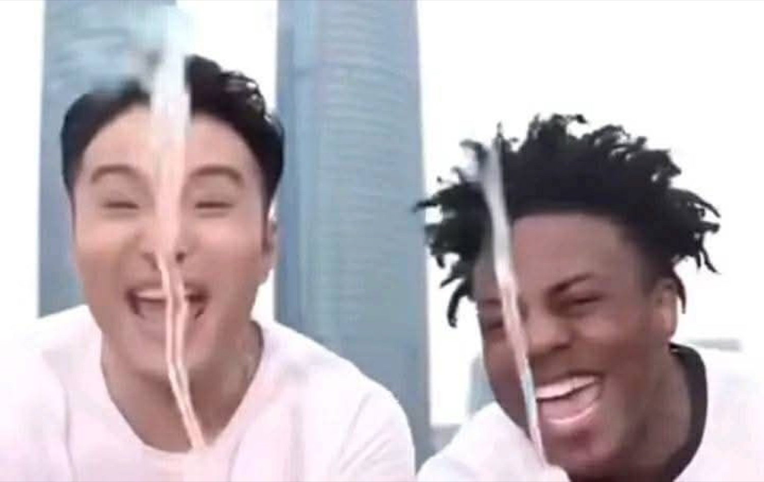 Two people laughing so hard they're crying with water shooting out their noses