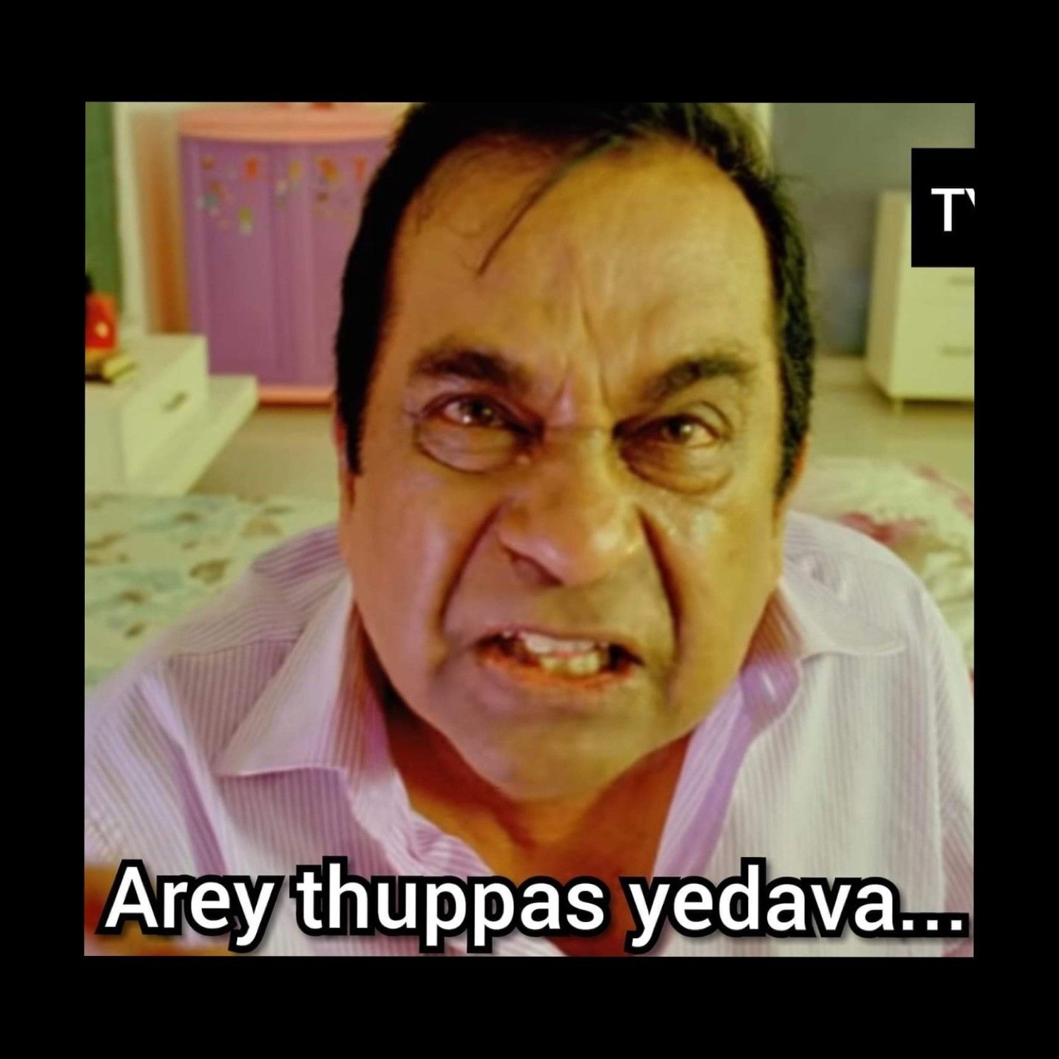 Brahmanandam grimacing: 'Arey thuppas yedava...' (hey, you useless fool)