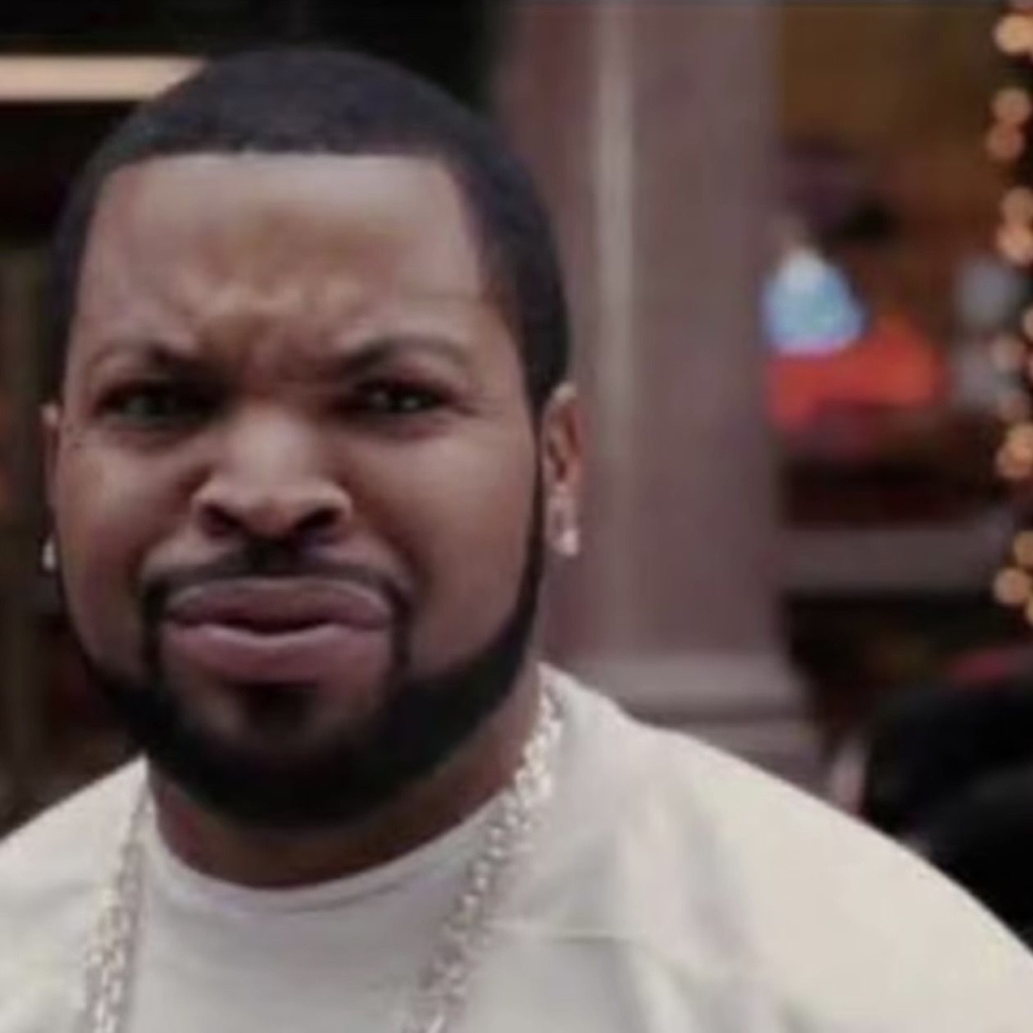 Ice Cube scrunching his face in disgust, thoroughly unimpressed