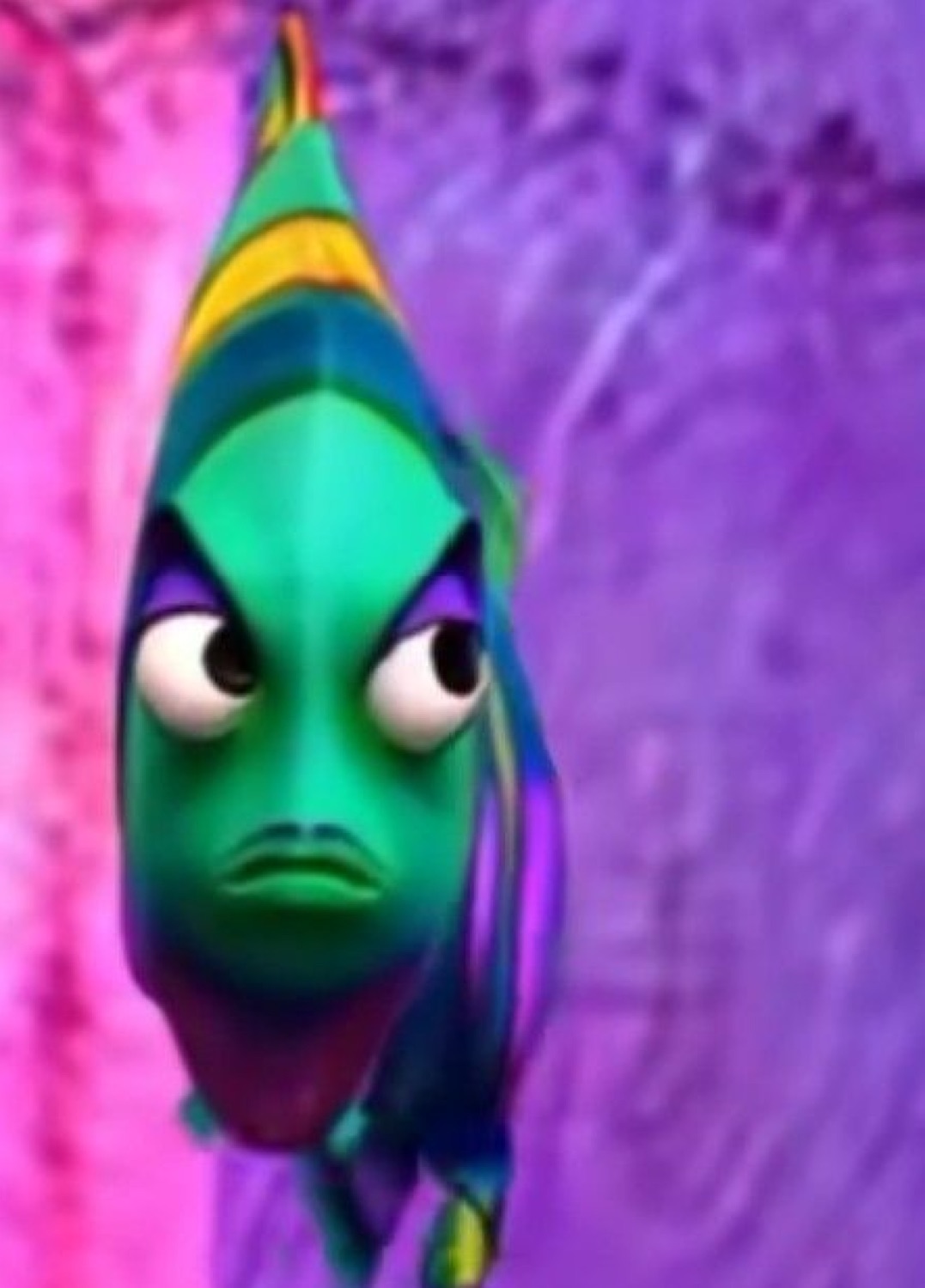 Green cartoon fish glaring straight ahead with a grumpy annoyed frown