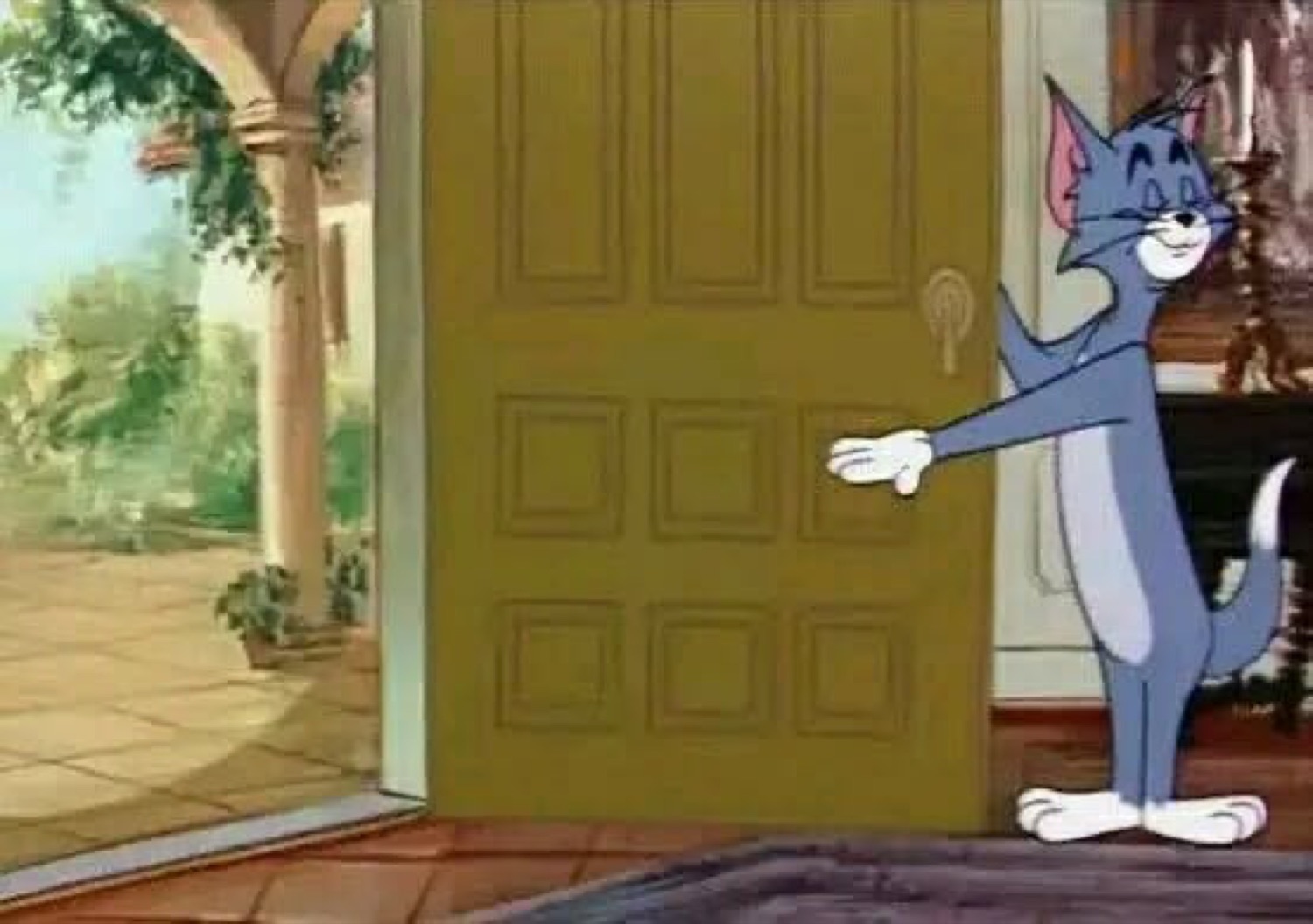 Tom from Tom and Jerry holding a door open and gesturing for someone to leave