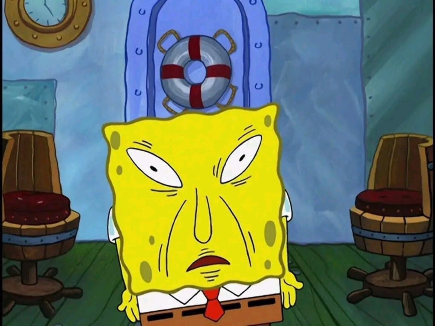 SpongeBob slumped at the Krusty Krab counter with a deeply scrunched, furious scowl